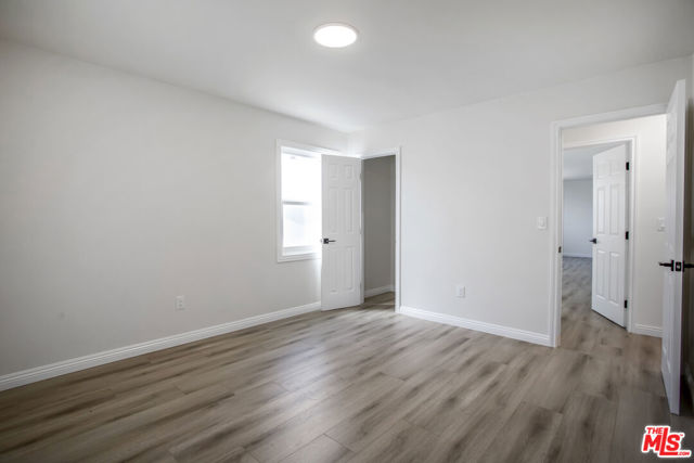 11119 S Denker Avenue, Los Angeles CA: https://media.crmls.org/mediaz/26d3e9b4-cf3c-4cbd-a090-a2d8f7bf9089.jpg
