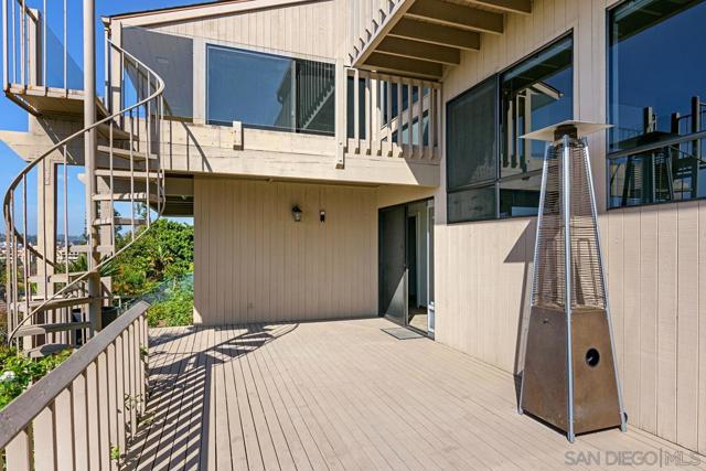 Deck and spiral staircase to middle deck.