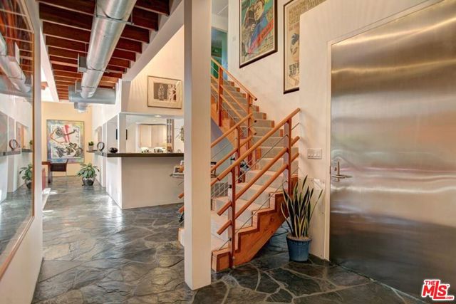 2314 San Ysidro Drive Beverly Hills, California Sophisticated Architectural Modern home situated on a prime, serene setting with canyon views. Rebuilt 1986-1993. Robert H. Taylor, Architect. 4 Bedrooms 3.5 Baths + Loft and Media Room. Two story Livingroom with fireplace. Stylish finishes, custom maple cabinets, hardwood/slate/stainless steel and exposed wood create a wonderful open flow. Glass doors lead to private yard with pool and spa. Private deck with canyon views. Impeccable move-in condition. Entertainers Dream Home.