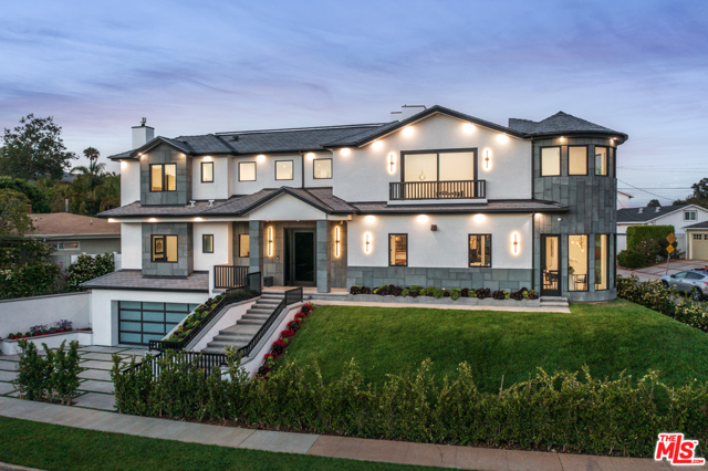 506 N Las Casas Avenue Pacific Palisades, California Welcome to this captivating coastal new construction home in the highly sought after Las Casas Loop of Pacific Palisades just minutes from the Village. This five-bed, eight -bath residence features a light, bright and open floor plan, showcasing California's indoor-outdoor lifestyle. The home's crisp white stucco exterior is adorned with natural blue stone to create a sophisticated palette that blends perfectly by the coast. Completed with modern finishes and clean lines throughout. A welcoming 3-story entry flows into an expansive living, dining rooms and Chef's kitchen with an exquisite marble book-matched kitchen island. The main level has great entertaining spaces, an office, and great indoor/outdoor spaces. Lounge in the lower level, which includes a home theatre that connects to a wine storage area, exercise room/game -room, an additional oversized en-suite bedroom and a 3 car garage. The 3rd floor upper level features a primary suite with ocean vistas , 3 en-suite bedrooms with ocean and mountain views and access to the rooftop deck. The rooftop deck is a great space to entertain or hang out and offers 360 degree views and a constant ocean breeze. Outside a well-proportioned rear yard offers a pool and plenty of space to relax and wind down.