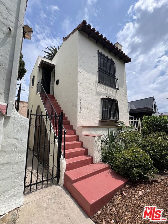 1306 S Mansfield Avenue, Los Angeles CA: https://media.crmls.org/mediaz/28f670bd-015d-48df-bce5-266564a672fd.jpg