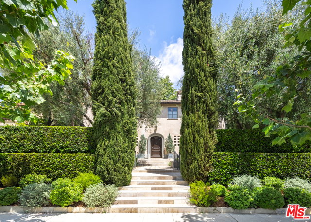 120 N Mccadden Place Los Angeles, California Stunning, published 1927 French Mediterranean. Former home of renowned architect William Hefner and his designer wife Kazuko Hoshino. Entry courtyard with olive tree and fountain to a classic 2-story main residence reminiscent of the French countryside with high quality finishes and materials throughout. Limestone window and door sills, refinished wood and restored period details. Beautiful living room with fireplace opens to terrace and gardens. Formal dining room, library/office, chef's kitchen featured on HGTV with Calcutta gold marble, solid oak cabinetry, oversize center island, elevated fireplace and breakfast area opening to expansive terrace. The master suite has high ceilings, gorgeous marble bath, large walk in closet, fireplace and opens to view terraces on both sides. A separate large 2 story pool house/guest house/gym with 2 baths, inviting 2nd floor terrace with built in seating and fireplace. The incredible grounds include a 50 foot lap pool, sculpted hedges and incredible mature sycamore tree. Don't miss this incredible opportunity!