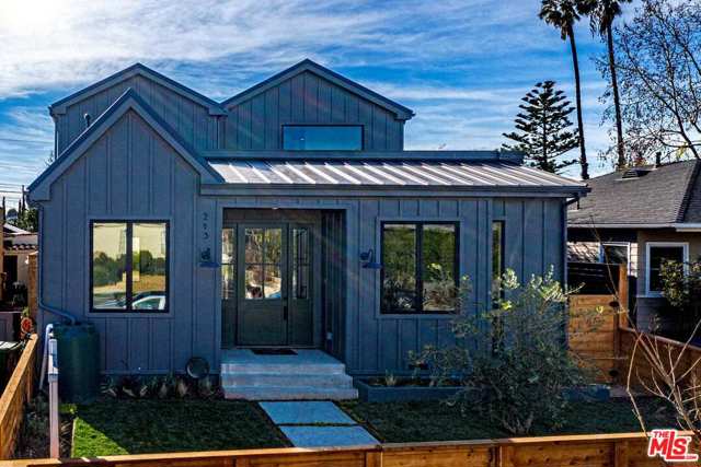 213 RUTH Avenue Venice, California Built by Thomas James Homes, this brand new home has been professionally designed, hand crafted to fit your needs, and comes with a full 10 year new home construction warranty. Custom farmhouse with 4 beds, 4.5 baths, study, guest suite, formal living with fireplace, chef inspired kitchen, and family room with fireplace. Upstairs laundry, two secondary bedrooms and baths, and a master suite with spa like bath, including a pocket door, freestanding soaking tub, walk in shower and walk in closet.