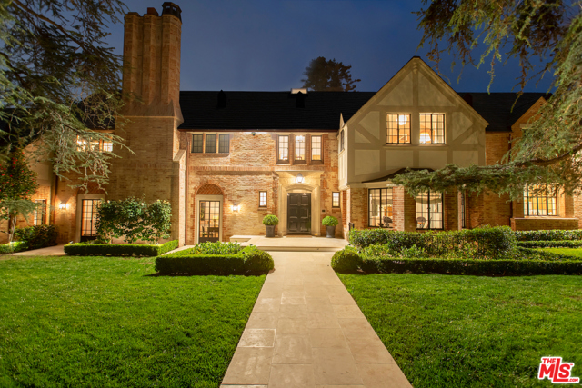 13510 Lucca Drive Pacific Palisades, California This timeless estate represents a level of character and luxury rarely offered and speaks to an era of architectural integrity with unmatched detail and quality. As one of the original homes in the Riviera section of the Palisades, this home boasts lavish amenities and enviable privacy. Gorgeous 100 plus-year-old trees flank over a flat half-acre, with west-facing grounds, beautiful swimmers pool and sport court, and treehouse. The gracious main rooms overlook the stunning southern terrace and grounds. A masterful kitchen boasts an immense island, state-of-the-art appliances, a windowed breakfast room, a generous butler's pantry, and an intimate family room. The massive dining and living rooms and private office are grand in scale, set against a backdrop of greenery. Upstairs there are five bedrooms. The primary suite is a lavish retreat with dual baths and dressing rooms. The secondary bedrooms all have private baths with imported tile. There is a primary house screening room and speakeasy. The separate, well-appointed pool house with additional space for entertaining, gym, guest suite and 2.5 baths has 20 ft ceilings in game room and a fireplace. The perfect home for large family gatherings and gracious events yet is surrounded by privacy and is one of the most significant estates to become available in the famed Pacific Palisades.