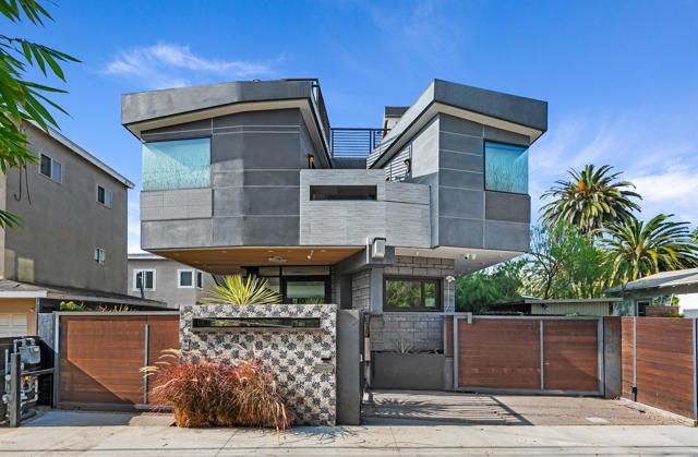 751 California Court Venice, California Luxurious modern masterpiece designed by Alon Zakoot, The stunning open floor plan showcases a ground level living area and gourmet kitchen equipped with Thermador appliances and European cabinetry, floor to ceiling pocket sliding doors that allow for a seamless indoor, out door lifestyle. Light features include floating lights, backlit base molding, and perimeter roof lighting. Upstairs the master has its own fireplace, corner pocket windows and walk-through closet with floor-to-ceiling cabinetry. The spa like retreat of the master bath includes 5 skylights, art deco wall coverings, and a rainforest shower. Relax at the end your day by watching the sun go down over Venice from your private sky deck with BBQ area, 9 ft fire table, and built-in speakers. Furniture is also for sale. Walking distance to the beach, Venice canals and Abbott Kinney with its chic shops, great restaurants and art galleries.