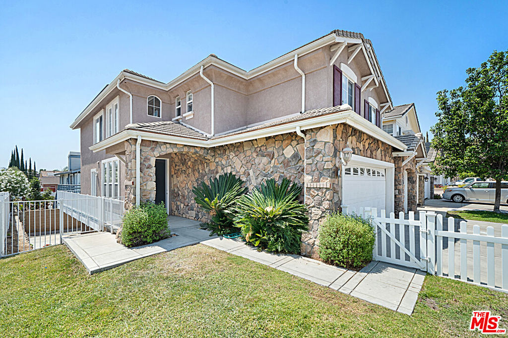 195 Midbury Hill Rd is a gem situated in the heart of Newbury Park. This quiet neighborhood with mountain views is the perfect place to begin your new chapter. This is a four bedroom home with 3.5 bath AND tons of extra space to make of it how you wish. The main entrance opens up to a grand room with 2 story ceilings and many windows that allow for bright and natural lighting to seep in. The main floor has a powder room, separate dining room and an enclosed bonus room. The kitchen and kitchen island open up to another family room with a balcony. Around the corner leads a set of stairs to the lower level. This lower level has it's own private entrance - perfect for renting out and making extra income, or utilizing as a home office, workout room, or kids' playroom! It is a generously sized room that opens up to the backyard with a full bath. The top level consists of 3 bedrooms, including the primary suite, a laundry room and a full bathroom. The primary bedroom also has it's own balcony and the bathroom has a walk-in closet, tub, double vanity and a stand up shower. There are solar panels and the new buyer must assume the lease. The home has a new deck, new carpet throughout and is freshly painted. Overall, this home is truly one of a kind and is waiting for someone to make use of it's gracious space!