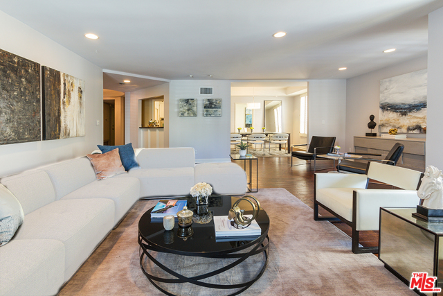 155 S Swall Drive 101 Los Angeles, California Also available for sale @ $1,050,000. Enter the double doors to this beautifully appointed & recently updated entertainers dream home with over 2,000 sq. ft of living space. This light-filled 2 bedroom 2 bathroom condo boasts dark hardwood floors, crown moldings, and plantation shutters throughout. Features include a large eat-in kitchen with stainless steel appliances, laundry room, wet bar perfect for entertaining, formal dining room, and expansive living room complete with a fireplace and a balcony. This gorgeous home sits perfectly among the tree lined streets adjacent to Beverly Hills and a short distance to trendy Robertson's fine dining and shopping. Complete with loads of storage, 2 side by side parking spots, pool, spa, and recreation room, this home is not to be missed!