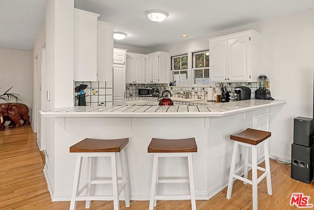 Drew Fenton | 172 S Woodburn Drive Los Angeles CA | MLS: 7292069