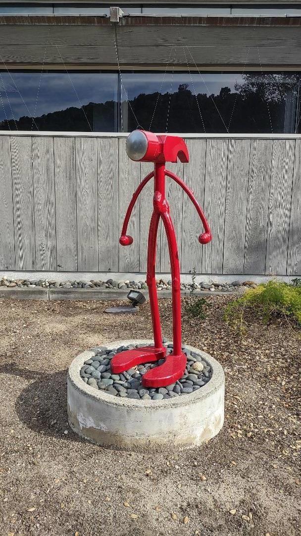 Entry greeted by Hammer Man sculpture