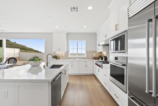951 Visalia Pl, San Marcos CA: https://media.crmls.org/mediaz/2a85d4f1-1c0d-4a66-864b-ef2e19f78a4d.jpg