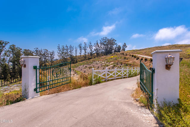 Over 54 acres of rich ag land nestled in the hills of Camarillo with endless views of the coastline and Channel Islands! This beautiful parcel has tremendous potential all within 10 minutes of the city of Camarillo and approximately an hour of both Los Angeles and Santa Barbara. As you enter the gates, you will find acres of Haas avocado trees and passion fruit vines fed by 2 private wells and supplemented by public water supplied by Camrosa Water. Build your custom dream home while enjoying the tennis court, workshop/garage and casita. Great potential for equestrian facilities as well.