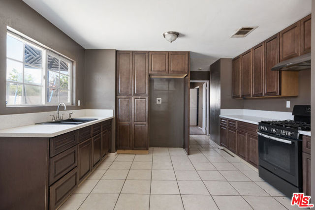 1408 W Olive Street, San Bernardino CA: https://media.crmls.org/mediaz/2c0ec183-f2a4-4325-bf98-4fd43f1db861.jpg
