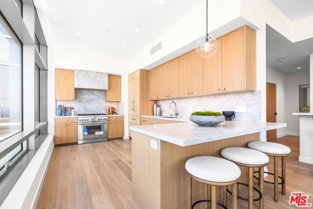 900 W Olympic Boulevard, Los Angeles CA: https://media.crmls.org/mediaz/2c4b1e7a-b66f-47dd-89e1-7719ae68d862.jpg