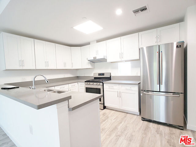 1229 S Kingsley Drive, Los Angeles CA: https://media.crmls.org/mediaz/2cd8dbe6-1cc8-4e70-b698-eba260337b55.jpg