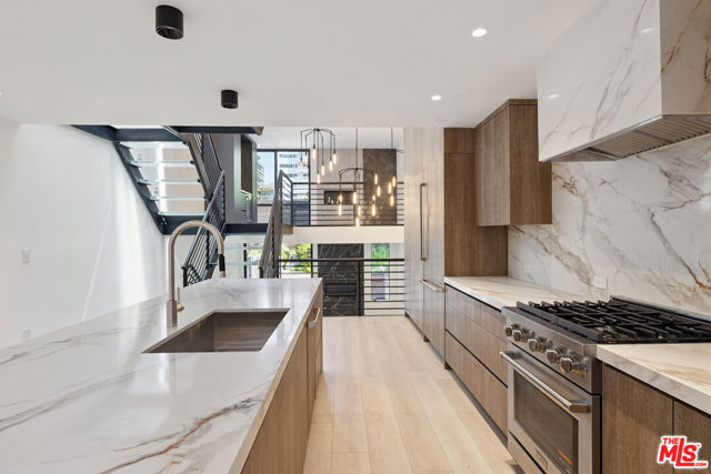1033 Carol Drive, West Hollywood CA: https://media.crmls.org/mediaz/2d335a85-0073-4df3-b98e-aa1c9bf2f862.jpg