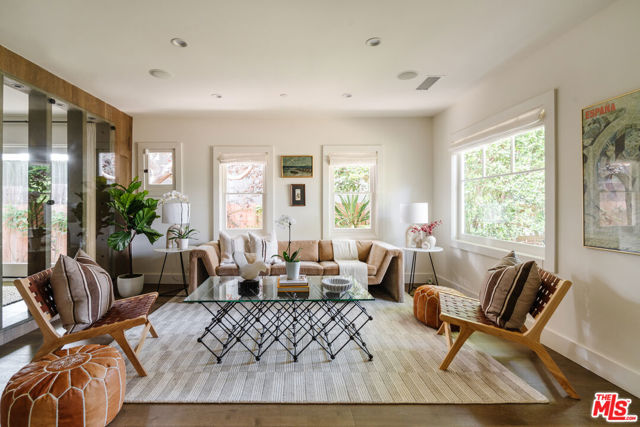 934 Amoroso Place Venice, California $100,000 Price Improvement! Nestled along Venice's coveted walk streets, this exquisite California craftsman, envisioned by Bill Tsui, is a symphony of luxury and tranquility. With 4 bedrooms and 3.5 baths, it boasts a new chef's kitchen adorned with designer finishes, high-end appliances, and marble countertops. The flowing layout encompasses a custom wine wall, sunlit living, and family rooms. Upstairs, the master suite offers a walk-in closet, a private balcony, and a lavish ensuite with a double vanity, walk-in shower, and soaking tub. Two guest bedrooms and a bath grace the upper level, while downstairs presents another bedroom and bonus room adaptable to an office or fitness space. This haven includes a 2-car garage, laundry room, and a tree-framed front yard for basking in California's sunlight. Moments from Abbot Kinney, this distinctive abode is an opportunity not to be overlooked.