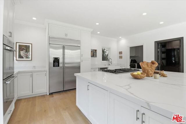 2003 El Cerrito Place, Los Angeles CA: https://media.crmls.org/mediaz/2e68f84d-d0aa-405d-a4d5-af173342db20.jpg