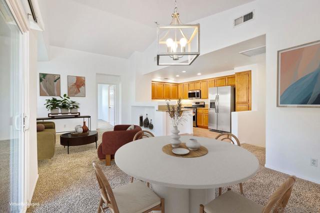 VIRTUALLY STAGED Dining Room.