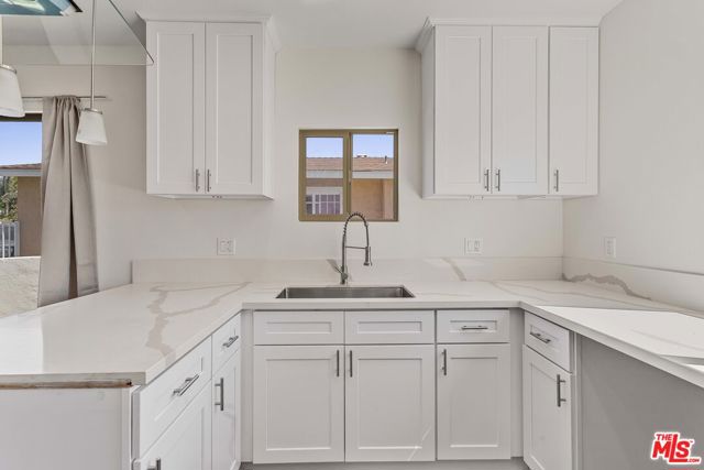 1622 W 66th Street, Los Angeles CA: https://media.crmls.org/mediaz/2e917cab-d1d6-4538-a4c6-681055b31d5d.jpg
