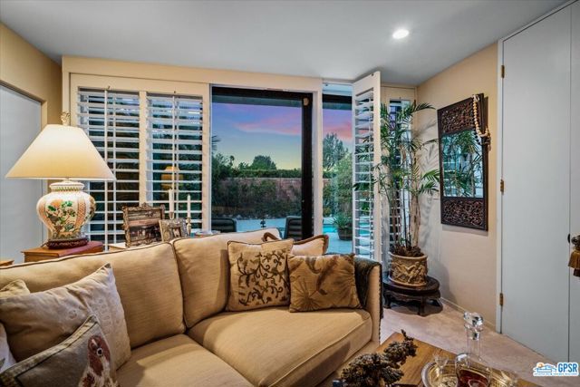 View from bedroom sitting area out to pool and spa