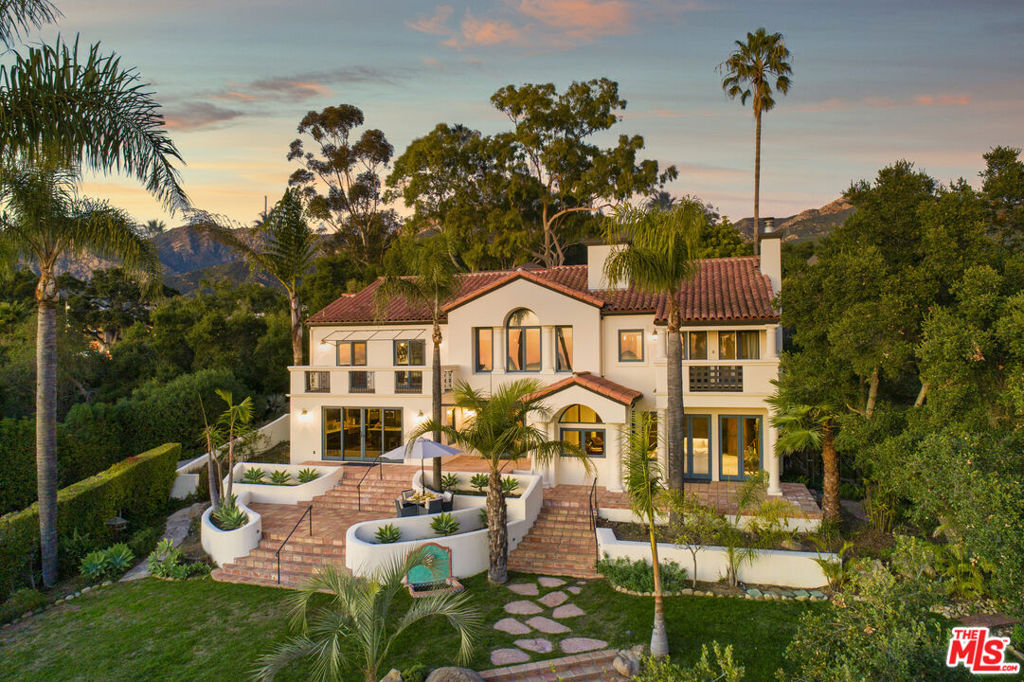 438 El Cielito Road Santa Barbara, California Stunning, panoramic ocean and island views on a luxurious, resort-like acre with lush grounds awaits you at 438 El Cielito Road. Many amenities- outdoor gourmet kitchen with a wood burning pizza oven, firepit, sumptuous pool, & cabana with outdoor shower. The cabana is graced with built-in heaters, a full bar, & spectacular Al Fresco dining options. The indoor entertainer's kitchen features double ovens, a Sub Zero refrigerator, eat-at bar and a lovely breakfast nook. Experience the luxury of this estate with your own private botanical gardens and paths. The main residence has a primary bedroom suite with a private, view balcony, fireplace, & separate sitting room. Winding wood/tile staircase, custom tile murals, central air, ocean view terraces, media room, and two main floor bedrooms complete this home. Photos are from 2020.
