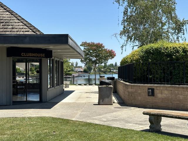 Quail Lakes Club House facing one of the lakes.