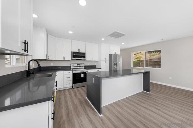 3335 37 S Barcelona St., Spring Valley CA: https://media.crmls.org/mediaz/304d40e6-9c4c-4044-8189-a87a594be7e6.jpg