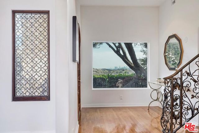 3595 Wonder View Drive, Los Angeles CA: https://media.crmls.org/mediaz/305a13be-7aae-491e-bd79-1ca2403518c6.jpg