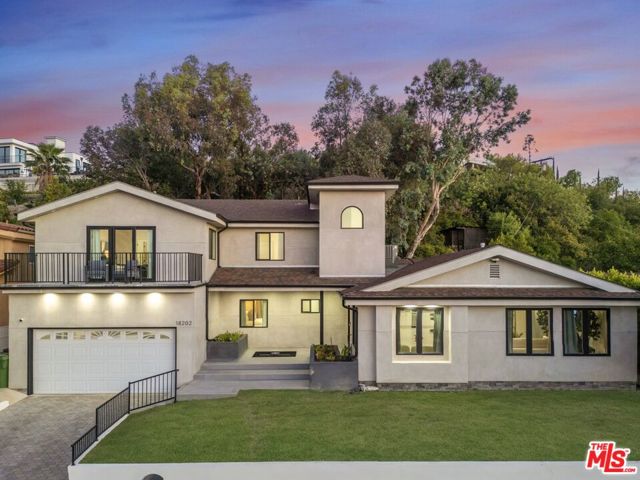 18202 Rancho Street, Tarzana CA: https://media.crmls.org/mediaz/306da7fb-9192-49c7-82d8-586d2dec30f2.jpg