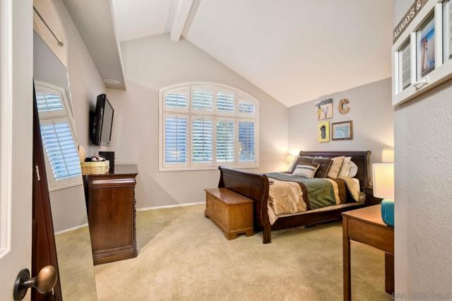 Vaulted ceilings, custom window shutters and plenty of space for bigger furniture make the master a nice retreat.