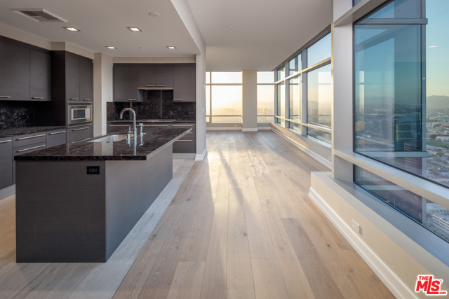 900 W Olympic Boulevard 44G Los Angeles, California A rare opportunity to own in one of Los Angeles most prestigious buildings. Perched high in the sky, Penthouse #44G boasts 3 beds, 4 baths, floor to ceiling windows, a contemporary chefs kitchen featuring Gaggenau appliances, and custom lighting fixtures. The sprawling single story 4,300 sqft unit spans from edge to edge of the iconic building offering breathtaking views to the ocean, mountains, and city. The ultra private Master suite has a separate entrance, and his and her walk in closets. The unrivaled amenities include: 24hr concierge and valet, room service, rooftop pool and cabanas, fitness center, champions sky lounge, wine tasting room, a 5-star spa and salon, as well as private security.