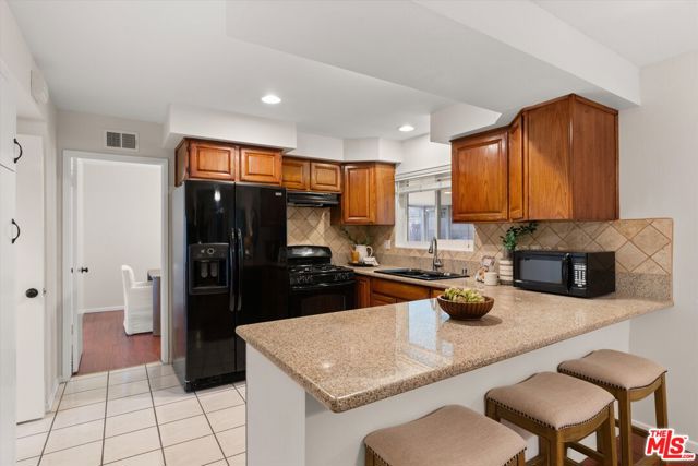 1407 E Kramer Drive, Carson CA: https://media.crmls.org/mediaz/310493fc-0b33-4f22-b0b5-86dc860efde3.jpg