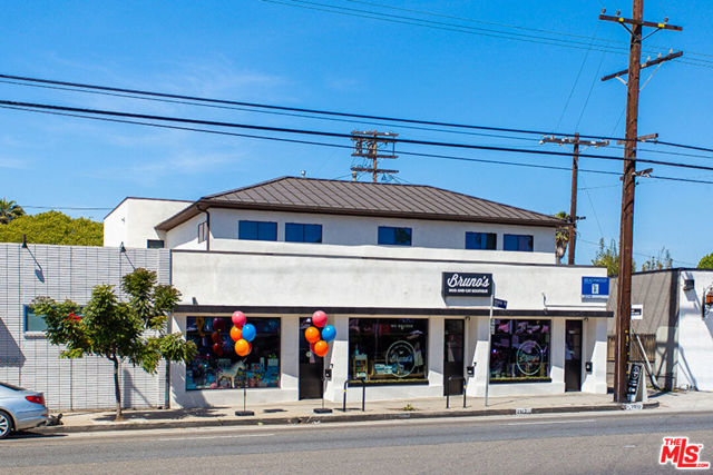 2010 Lincoln Boulevard Venice, California Welcome to this premiere opportunity for a modernized commercial/office/residential mixed-use building in the heart of Venice, at a CAP RATE of 5.4%! Located on one of the most well-known streets in Los Angeles, this building is perfect for an owner/user or as a high-return investment opportunity. Endless options are here in this well-maintained building, which was completely remodeled in 2014, and offers you the perfect property for your 1031 exchange and passive income investors. With amazing frontage, this property is made up of 3,603 sqft divided into 4 retail/office units. All units are tenant occupied with all three 1st floor retail spaces ranging between 660 to 768 sqft, with the entire ground floor (all three units) rented to a well-known local favorite pet store. The entire bottom floor space has been thoughtfully curated and is a perfectly cohesive space yet can easily be turned back into three separate spaces. Two bathrooms on the ground level and plenty of storage. Move upstairs to a fabulous designer-done office space that makes up the entire second floor. This open-concept space offers a kitchen, two bathrooms, and a conference room. Enjoy a fabulous expansive roof deck patio, with a beautiful trellis that encapsulates the space and gives an indoor/outdoor flow truly the perfect space! Located on "The Linc" you are in one of the most well-desired parts of the Lincoln Corridor. You are surrounded by amazing boutique shops, restaurants, and a quick walk to the new Venice West live music venue. Situated in a high-traffic area, within a mile of Abbot Kinney and the beach, this is one of a kind and not one to be missed!