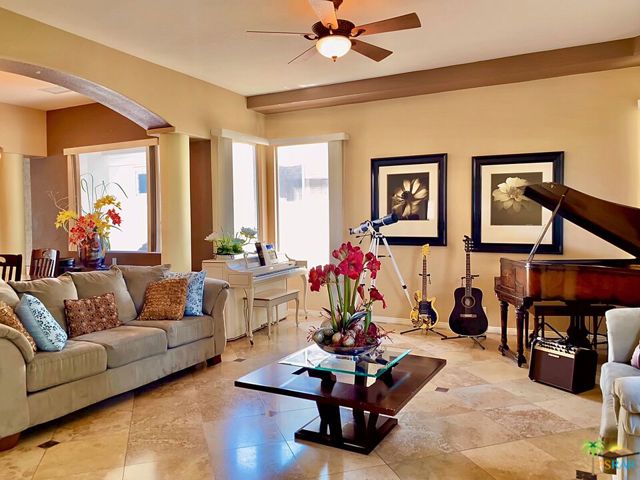 47930 Via Livorno La Quinta, California This beautiful home in sought after Lake La Quinta, has a unique and very open floor plan. Boasting 4 large bedrooms and 4 full baths, very large formal living room and formal dining room, family room and breakfast room. Floors throughout are travertine. Heated pool. The 24/7 gate guarded lake community offers a 25 acre private lake for boating and fishing. Community also offers outdoor party facilities, pool, tennis courts, bocce ball court, and a private park bordering the lake with endless mountain views. Also included in your $436 monthly HOA is WiFi and cable with HBO and Cinemax.