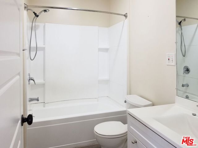 3166 San Marino Street, Los Angeles CA: https://media.crmls.org/mediaz/32cdaab8-ca32-4adf-a34e-1169a2fbd0f1.jpg