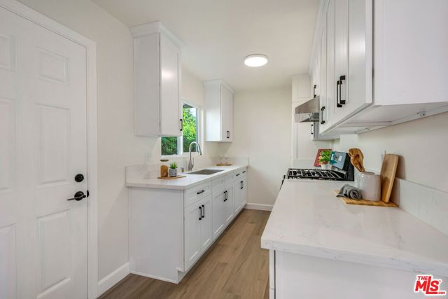 4933 W 20th Street, Los Angeles CA: https://media.crmls.org/mediaz/330b3c65-7c2b-44e6-8991-75e608f4e114.jpg