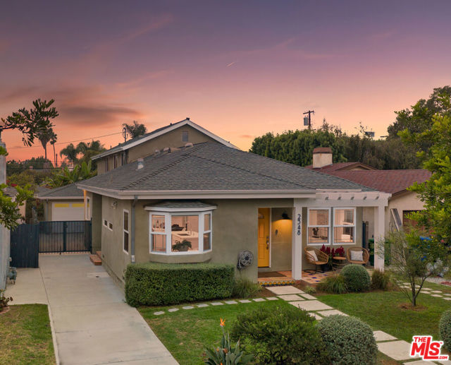 2348 29Th Street Santa Monica, California Crisp, remodeled traditional home w/modern amenities, coupled w/sleek finishes, great daylight & charm. Located mid-blck, on a quiet, treelined st in Sunset Park, this turn-key home offers an expanded floorplan w/4 bds, 4 remodeled baths & a variety of hard-to-find public & private spaces to entertain, relax, study/work or play. Up front, an open concept liv/din/kit w/warm hrdwd flrs, white walls, remodeled cook's kitchen w/quartz counters, large island & sleek white cabinetry. 2 bd, 2 ba, laundry rm, large study/play area & additional rear family rm opening to wonderful yard: grass, swing set, fruit trees & patio. Upstairs offers a private & sunny primary bedroom suite, loft (perfect study area/reading retreat) + additional gst bedroom suite. The attached 2-car garage is ideal for an ADU-conversion, parking or great multiple purpose/rec. rm. Beautifully updated w/rare flexibility & a sprawling, spacious floorplan. A hard to find package, located in the coveted Grant School district.