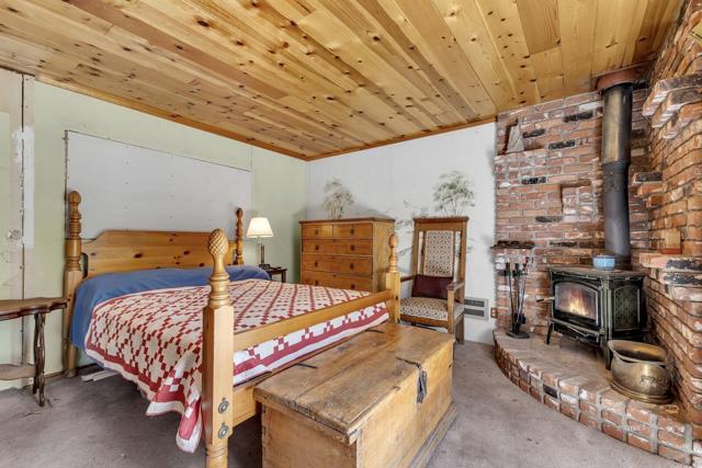 29 Main bedroom with wood stove