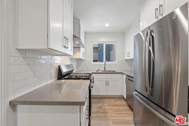 1250 N Crescent Heights Boulevard, West Hollywood CA: https://media.crmls.org/mediaz/3351cf4e-5bda-4ea6-8419-8ca29b4a0d2c.jpg