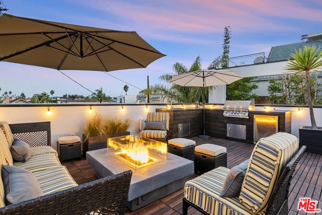 214 S Venice Boulevard Venice, California You've discovered the newest, impressive architectural 2 blocks to the Ocean & adjacent to the Venice Canals. A David Hertz redesigned property featuring an impressive 3bed, 3bth home. Above & beyond, thru a private entrance offers the option for a: Perfect live/work creative ofc space, income generating rental or 1+1 gst house w/ full kitchen, bath, lndry & deck. This expansive teakwood, deck overlooks the nearby canals & features a: BBQ grill, sink, fridge & firepit. Ideal for entertaining, dining or star gazing. Its open kitchen offers a walk-in pantry, wine cooler, Sub Zero fridge, Viking range, custom cabinets & intimate countertop dining for 6. Enjoy a 2-story reclaimed fpl lounge leading to a private atrium for AM coffee or PM cinemas. The Master BR wing provides a prvt terrace, fpl, custom walk-in closet & luxurious bth w/ skylights. Gym/flex/garage up front & invaluable 3 car garage in back. It is time to move the office home & keep it professional! This is your next venture.