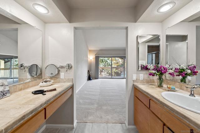 Master en suite bathroom offers sink vanity and make up vanity