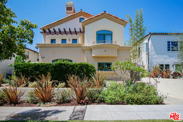 1022 10Th Street 103 Santa Monica, California Bright & Airy 2-Story Townhouse in Highly-Coveted North of Wilshire Neighborhood of Santa Monica. Residing within a beautiful Mediterranean- Inspired Gated Complex, this Townhouse features an Open Modern-Concept Layout with upgrades throughout. High ceilings w/ crown mouldings greet you in every room. Living room w/ hardwood floors and custom fireplace w/ adjacent open-air patio. Highly upgraded kitchen w/ boxed-in ceiling, custom hardwood cabinets, granite countertops, stainless steel appliances & custom cooktop backsplash. Master bedroom features soaring vaulted ceilings w/ walk-in closet. Highly upgraded Master Bathroom w/ custom stone-work throughout, whirlpool tub w/ picture window & separate shower. Rooftop patio w/ expansive views is ready for your imagination perfect for entertaining! 2-car garage. Prime location just steps to the finest dining & shopping in town. Turnkey!