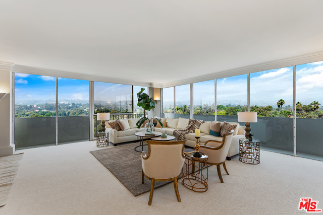10433 Wilshire Boulevard 909 Los Angeles, California Wonderful opportunity to own a 3 bd, 3ba unit in the full service Wilshire Holmby. This light and bright 9th floor unit faces away from Wilshire and has huge wrap-around windows to see the breathtaking north and east views of Bel Air, UCLA and the Getty. The third bedroom is currently opened up and being used as a den adjacent to the living room. This makes the living space HUGE for entertaining. The master suite is on the opposite size of the unit from the second bedroom for privacy. Master bedroom has lots of closets and ensuite bath with granite counters, separate tub and shower. All electric kitchen. Parquet wood floors in the hallways and kitchen, new carpeting and recessed lights. Cable & internet included in HOA dues. 24 hr security and valet, pool, gym, rec room with kitchen. Warner Ave. Elementary School.