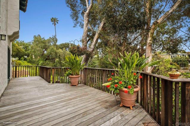 Upper terrace back deck with access points from the dining room, living room, and 2nd bed/family rm