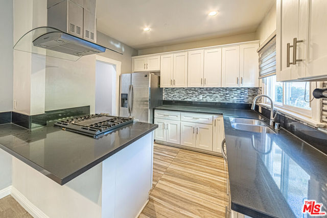 801 N Alexandria Avenue, Los Angeles CA: https://media.crmls.org/mediaz/348a432a-ed06-49bf-b3c0-bb9f17e78e9b.jpg