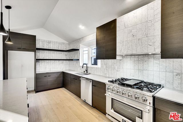 4122 S Bronson Avenue, Los Angeles CA: https://media.crmls.org/mediaz/34a84b14-5307-4060-b340-ae8d1523d73b.jpg
