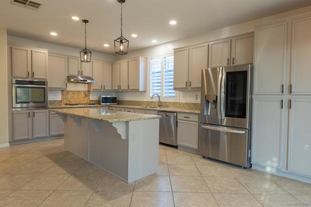 551 Dundee Ln, San Marcos CA: https://media.crmls.org/mediaz/34fc1d23-97a2-46ae-b97e-47618f38a000.jpg