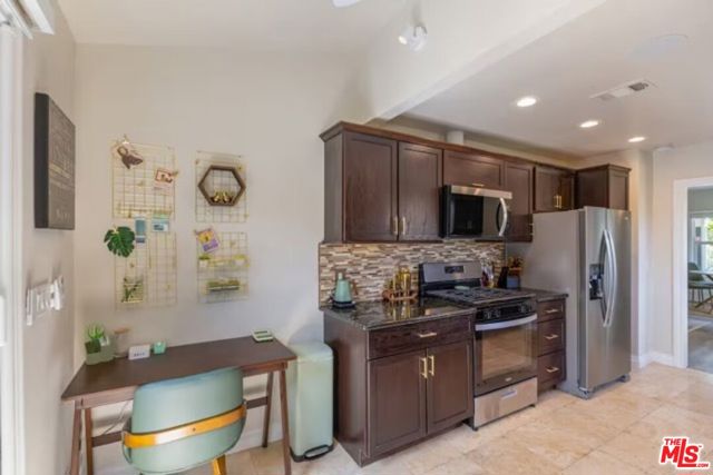 725 N Harvard Boulevard, Los Angeles CA: https://media.crmls.org/mediaz/35038e3a-347e-4725-a070-6ba5731f6863.jpg