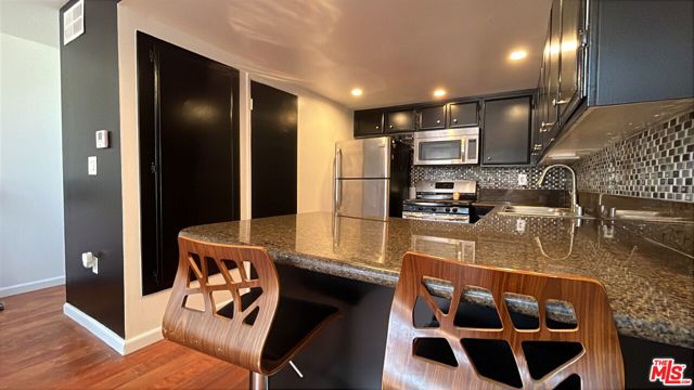 3050 S Bristol Street, Santa Ana CA: https://media.crmls.org/mediaz/3512939b-35e7-47f8-9206-ebeb145635c6.jpg