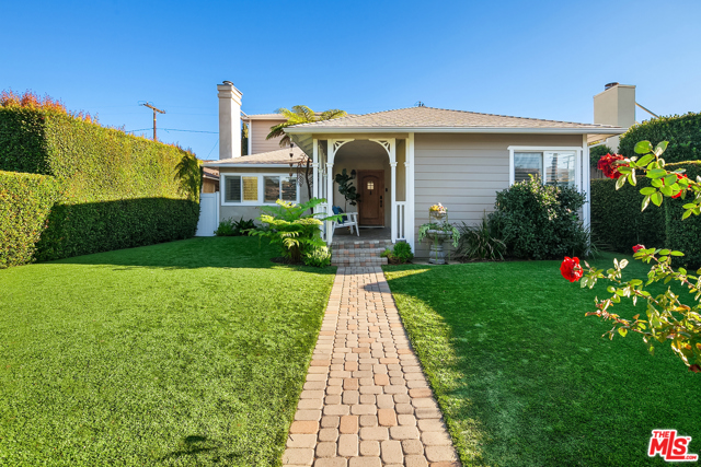 2018 Pearl Street Santa Monica, California Beautiful Sunset Park family home with wonderful curb appeal, rose bushes & a white picket fence! Enjoy the gardens & the perfectly manicured front lawn hedged in for privacy from your charming front patio. Walk into sunshine as this home has great energy, a formal entry & a living room with soaring ceilings, wood burning fireplace & windows w/custom blinds to let in the day. The kitchen overlooks a grassy backyard with nice sitting & dining areas. A warm semi formal dining room, two large bedrooms, a lovely remodeled bathroom & a terrific mudroom/office round out the downstairs. Upstairs find luxury in your large primary suite w/a stunning remodeled bath & views overlooking the backyard. The garage has been designed to function as a garage, office, work out room & place to hang out. The location & walkability are fantastic to Grant Elementary, Clover Park & the commercial hubs on Ocean Park and Pico Blvd full of community, local restaurants, art, cafes, & the best of Santa Monica.